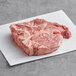 Rastelli's USDA Prime Bone-In Porterhouse Steak on white paper.