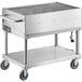 A large stainless steel Backyard Pro LPG36 outdoor grill on wheels.