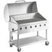 A stainless steel Backyard Pro outdoor grill with wheels.