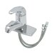 A silver T&S single lever faucet with flexible supply lines and a hose attached.