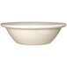An International Tableware York ivory embossed stoneware bowl with a white background.
