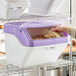 A large white and purple ingredient bin with a flip lid, label, and scoop, designed for allergen-free storage on a wire shelf.