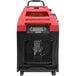 A red and black XPOWER commercial dehumidifier with wheels.