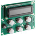 A green Narvon circuit board with a display and white buttons.