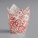 A white Enjay tulip baking cup with red swirls and hearts.