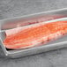 A Loch Duart Scottish salmon fillet on a metal surface.