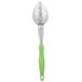 A Vollrath Jacob's Pride perforated basting spoon with a green Ergo grip handle.