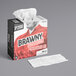 A case of Brawny Professional industrial cleaning towels with a red and white design on the box.