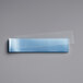 A blue rectangular object with a clear plastic band around it.