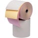A Point Plus 3-ply carbonless paper roll with different colors of paper.