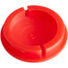 A red plastic Waterloo faucet handle cap.