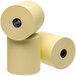 A group of Point Plus canary yellow cash register paper rolls.
