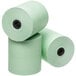 A group of Point Plus green bond paper rolls.
