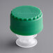 A green plastic Franmara wine pourer and stopper with a white lid.