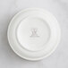 A RAK Porcelain ivory porcelain bowl with an embossed crown logo.