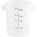 A clear plastic round food storage container with measurements on it.