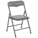 A gray folding chair with a black seat.