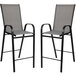 A Flash Furniture outdoor bar table set with 4 grey chairs with black metal legs.