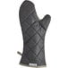 A black oven mitt with a grey lining.