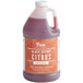 A half gallon jug of Pure Craft Beverages Black Cherry Citrus concentrate with a white label.