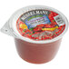 A close-up of a container of Musselman's Mixed Berry Apple Sauce.