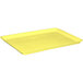 A yellow rectangular fiberglass MFG Tray market display tray.