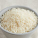 A bowl of Jasmine Rice on a table.