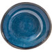 A blue Front of the House Artefact porcelain ramekin with a rim.