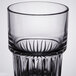A close up of a Libbey clear cooler glass with a textured pattern.