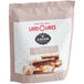 A bag of Land O Lakes Cocoa Classics S'mores and Chocolate Cocoa Mix with a close up of a marshmallow.