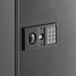 A black steel 360 Office Furniture wall mount key cabinet safe with an electronic keypad lock.