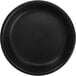 A black round International Tableware stoneware dish.