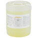 A white plastic container of Advantage Chemicals Low Temperature Dish Washing Machine Sanitizer with a yellow label.