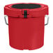 A red CaterGator round cooler with a black lid.