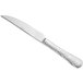 An Acopa Inspira stainless steel steak knife with a textured silver handle.