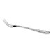 A shiny metal fork with a textured handle and three tines, photographed on a white background.