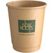 A New Roots brown paper hot cup with a green logo.