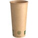 A brown New Roots paper hot cup with green text.