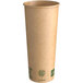 A brown New Roots compostable paper hot cup with green text on it.