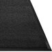 A Guardian Prestige black carpet entrance mat with a black border.