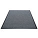 A grey carpet with black border.