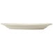 A Libbey Porcelain oval platter with a wide rim on a white surface.