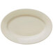 A white Libbey porcelain oval platter with a white rim.