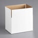 A white cardboard box with a brown lid.