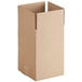 A brown cardboard box with a cut out top.