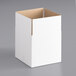 A white box with a cut out top.