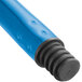 A blue fiberglass broom handle with a black rubber tip.