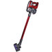 A red and black Atrix cordless stick vacuum with a red handle.