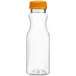 A clear Square Carafe juice bottle with an orange cap.