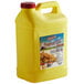 A yellow jug of Admiration Peanut Oil with a yellow label.